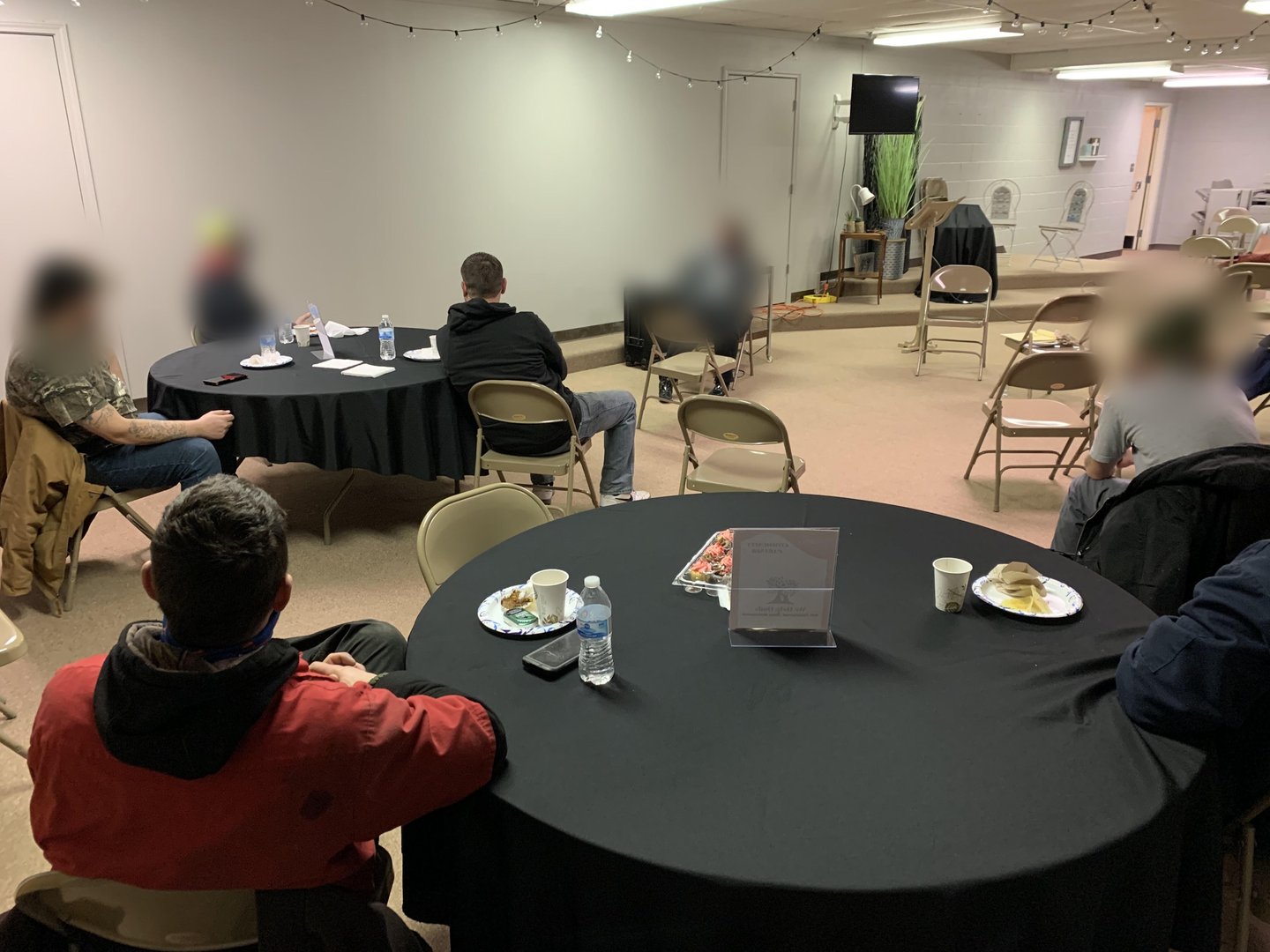 Dedicated Dads classroom discussion around round tables
