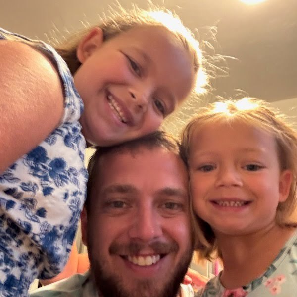 Joe with two children