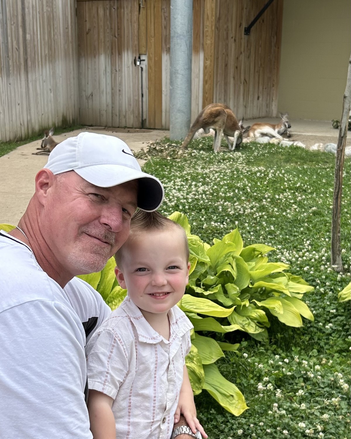 Rick and his son Charley in front of the kangaroo exhibit